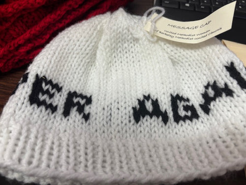Never Again Message Cap